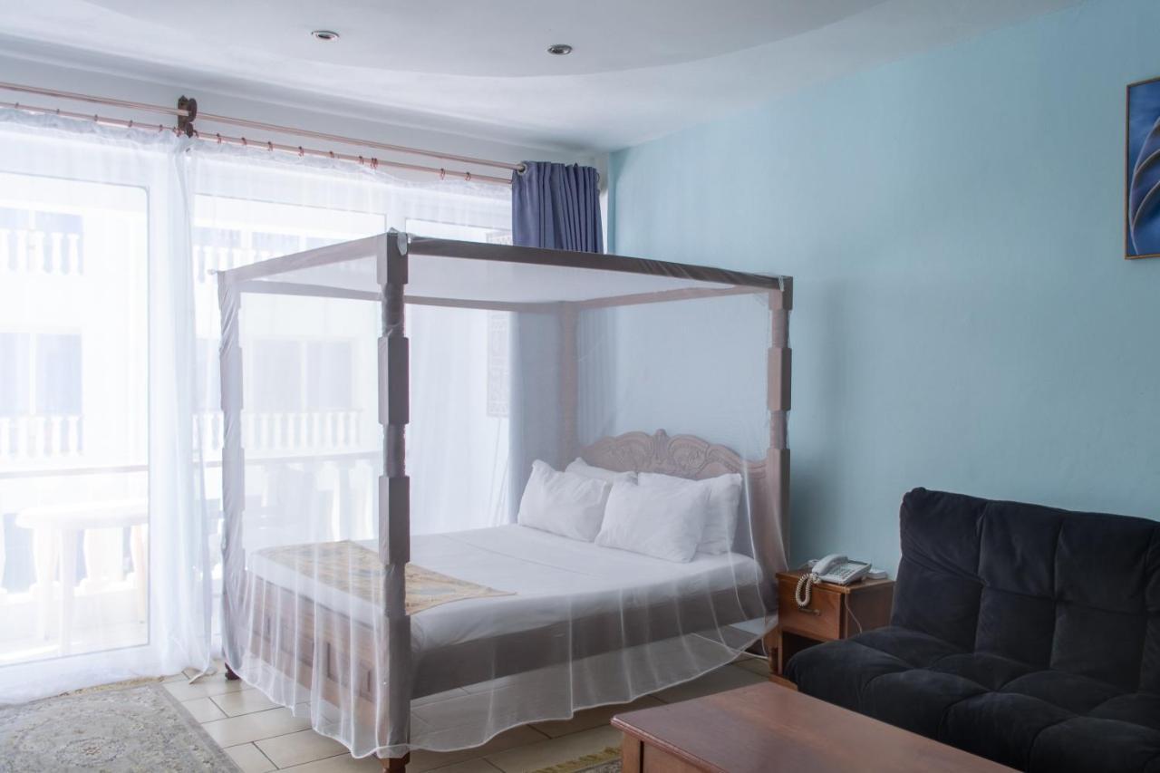 Cowrie Beach Haven Studio Apartment Момбаса Екстериор снимка